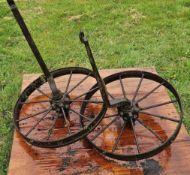 Two cast iron wheels