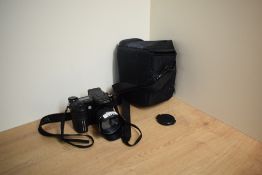 A Minolta Dimage A1 5.0Mega pixal digital camera with Minolta Gt 1:2,8-3,5 7.2-50-8mm lens in soft
