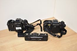 Two Pentax LX camera bodies and LX winder