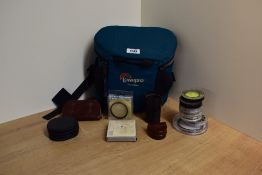 A range of filters and adapters, varying sizes and brands, including Cokin, Hoya, Olympus, Kood,