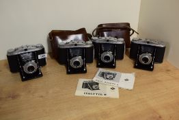 Four Agra Isolette II cameras with Solinar 1:3,5 75mm lenses
