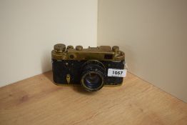An eastern European copy Leica in brass finish