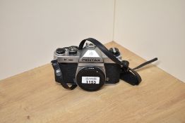 A Pentax K1000 camera body