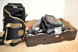 A box containing a Pentax Flash ring, Vivitar Light meter, Soligar Spot Meter, a Seconic flash/light