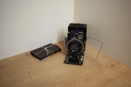 A Zeiss Ikon Trona 214/3 folding plate camera, circa 1929 with Tessar 1:3,5 10.5cm lens