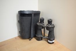 A pair of Bino Prism NoVIA 10x50 binoculars bearing military crowsfoot