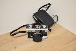 A Ricoh 500G camera with Rikenon 1:2,8 40mm lens