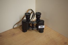 A pair of H Hughes & Son London x8 binoculars