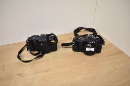 Two Pentax P30 camera bodies
