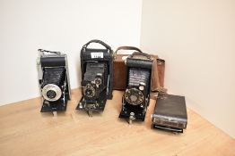 Four folding cameras including Six-16 Kodak Junior (as found), a Coronet Rapide, a No1 Autographic