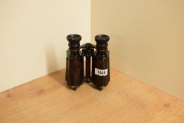 A Pair of Huet Paris extra lumineuse 8x binoculars