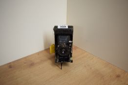 An early 20th century Goerz Tenax roll film folding camera with Campur shutter