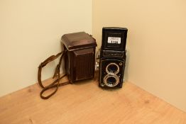 A Toyocaflex reflex camera in leather case