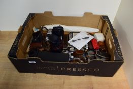 A box of light meters, rangefinders, Agfa bodies for spares, a slide viewer etc