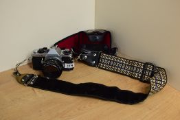 A Pentax ME Super camera with SMC Pentax-A 1:1,7 50mm lens