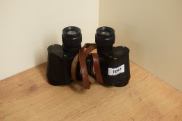 A pair of Huet Paris Trinotix 8x30 binoculars