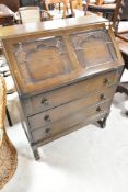 A traditional dark stained bureau
