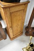 A Victorian satinwood pot cupboard