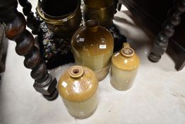 Three vintage stoneware flagons including Penrith and Hawes interest