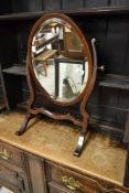 An Edwardian mahogany toilet mirror