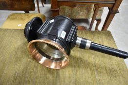 A vintage carriage lamp