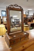 A 19th Century mahogany toilet mirror on drawer base