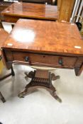 A 19th Century mahogany sewing table on William IV style base