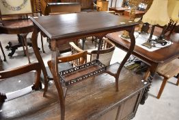A late 19th or early 20th Century mahogany occasional table having shaped legs and galleried
