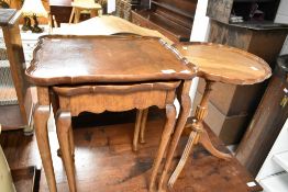 An early 20th Century mahogany two table nest and a reproduction occasional table