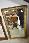 A 19th Century gilt frame over mantel wall mirror, approx. 117 x 64cm