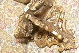 A giltwood sconce