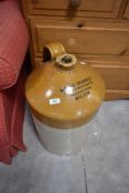 A large stoneware flagon, branded for National Colours, Bolton