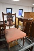 A Victorian mahogany salon chair and an early 20th Century oak twist leg occasional table