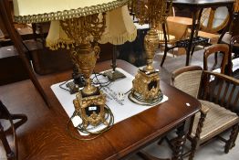 A pair of French baroque style elaborate table lamps, height to fitting approx. 66cm