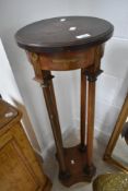 A classical style jardiniere stand