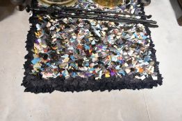 A vintage pegged rag rug, approx. 97 x 67cm