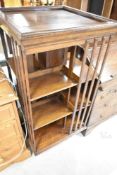 A late 19th or early 20th Century oak revolving bookcase, approx height 115cm