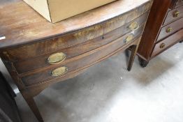 A 19th Century chest or dressing table comprising two drawers on square tapered legs, width