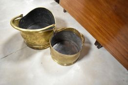 Two brass coal helmets