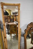 A vintage bamboo cheval mirror, height approx. 150cm