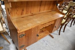 A vintage pine Bavarian style low dresser, width approx. 137cm
