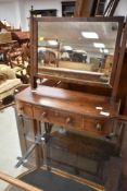 A 19th Century mahogany toilet mirror having drawer base