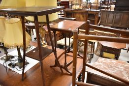 A traditional mahogany clothes maid and two occasional tables