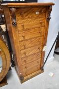 A 19th century satinwood Wellington chest of eight drawers, height approx. 132cm