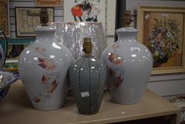 A pair of Denby Twilight table lamps with matching shades still in cellophane and a small Denby