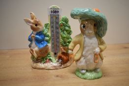 A Royal Albert Beatrix Potter 'Benjamin Bunny' figure sold together with Peter Rabbit in the form of