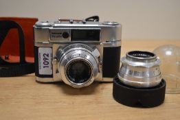 A Braun Paxette camera with Braun Katagon 1:2,8 50mm lens and a Staeble-teleson 1:5,6 85mm lens