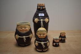A selection of Goebel porcelain monks comprising egg cup, mug, condiment pot etc.