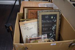A carton of assorted pictures and prints.
