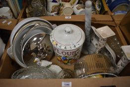 A decorated flour storage jar and pair of candlesticks stamped Italy, a pressed glass cake plate,
